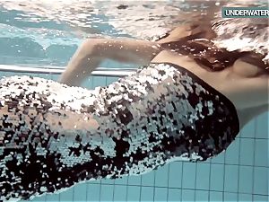 Loris blackhaired teen swirling in the pool